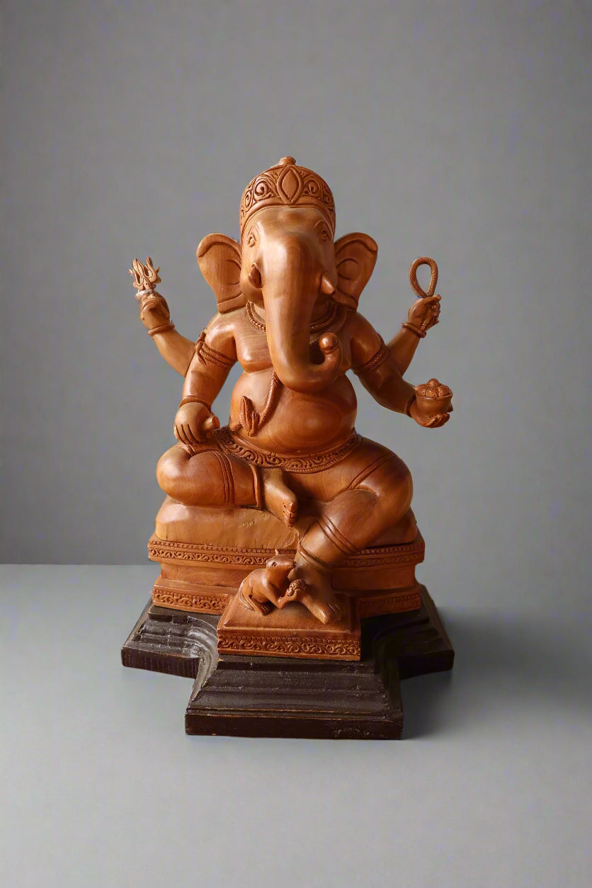sandalwood beautifully hand carved sitting lord ganesha - Malji Arts