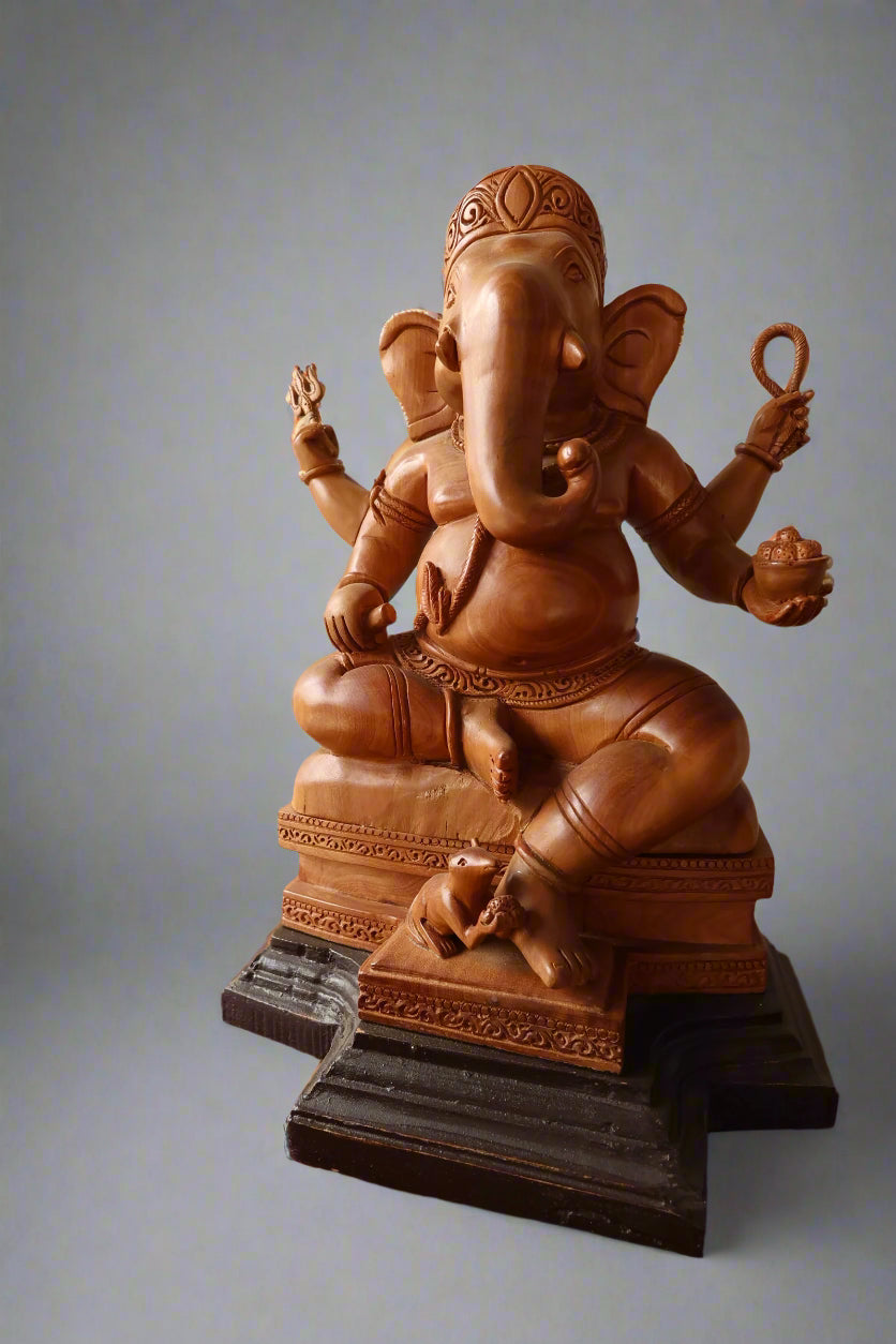 sandalwood beautifully hand carved sitting lord ganesha - Malji Arts