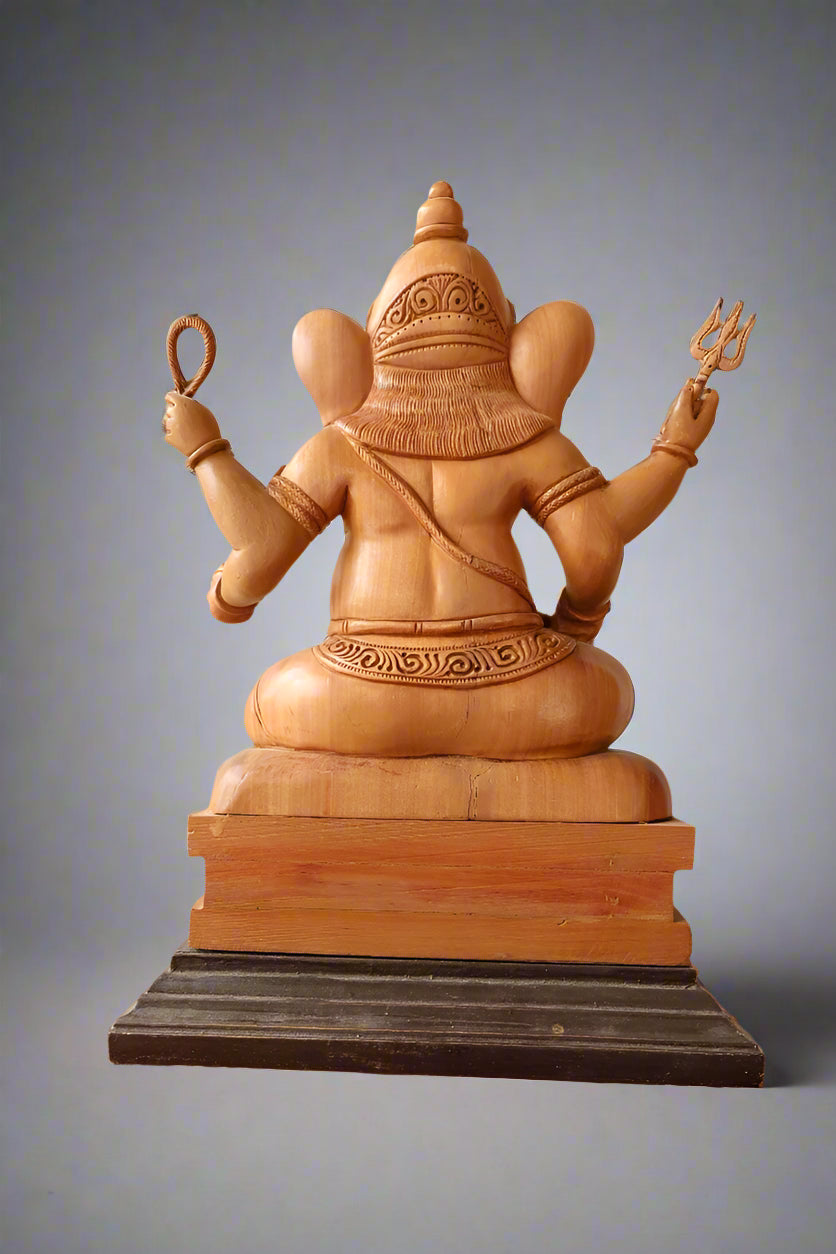 sandalwood beautifully hand carved sitting lord ganesha - Malji Arts