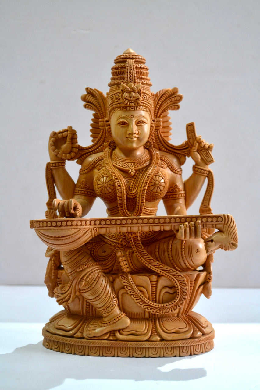 Wooden Special Carved Sitting Goddess Saraswati Statue - Malji Arts