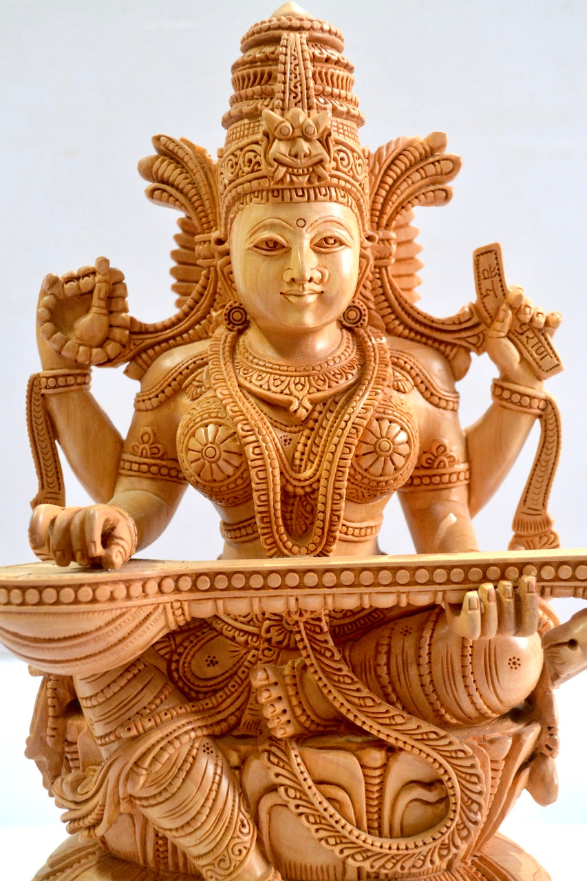 Wooden Special Carved Sitting Goddess Saraswati Statue - Malji Arts