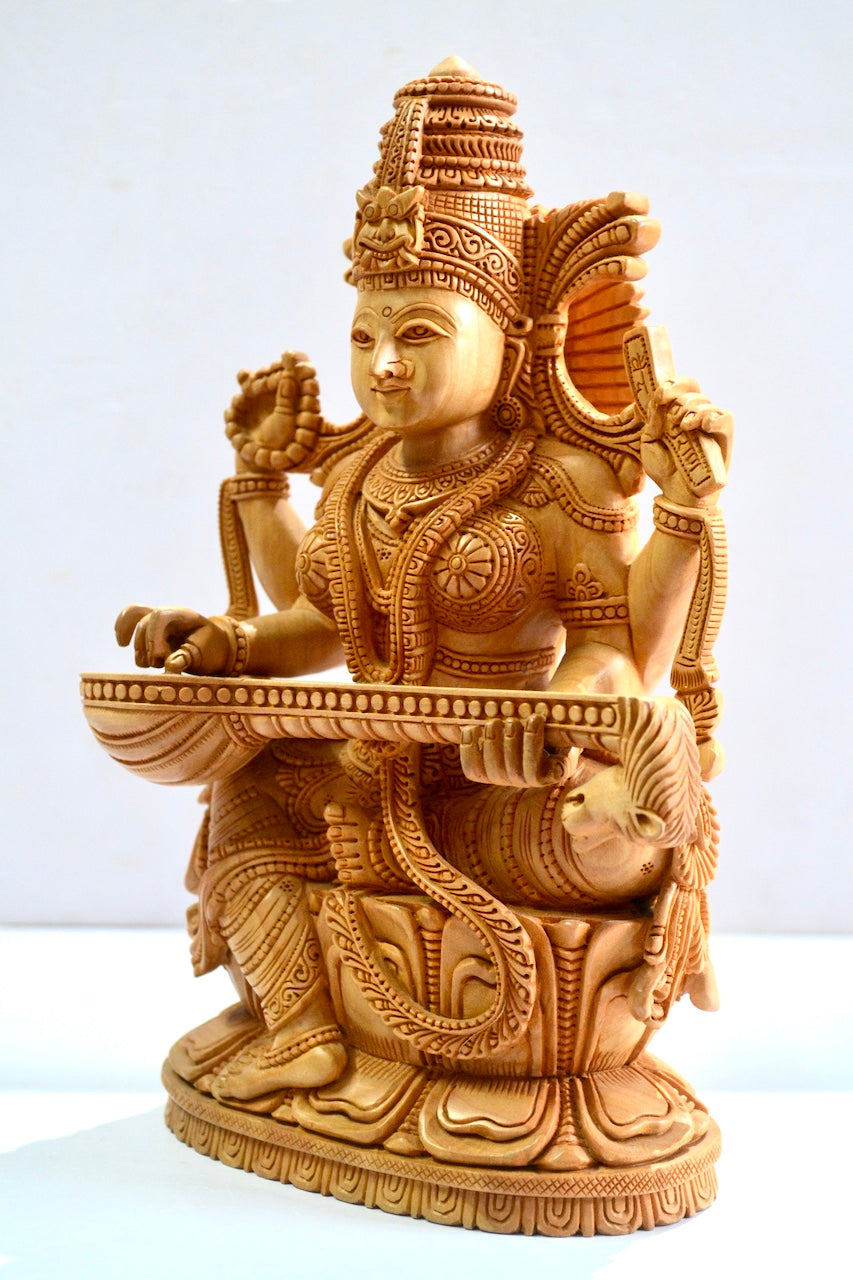 Wooden Special Carved Sitting Goddess Saraswati Statue - Malji Arts