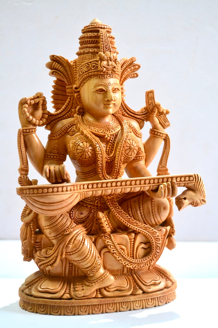 Wooden Special Carved Sitting Goddess Saraswati Statue - Malji Arts