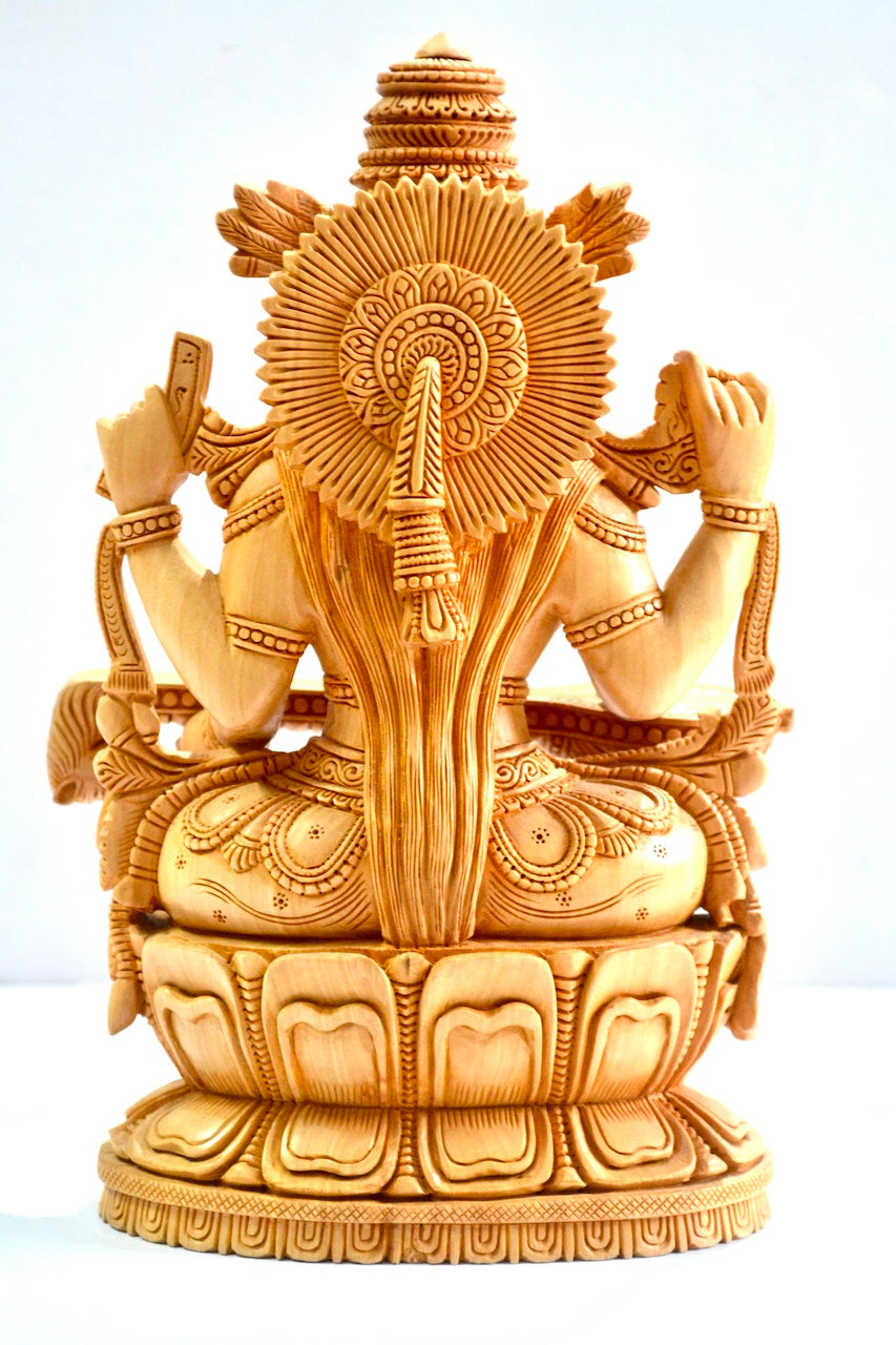 Wooden Special Carved Sitting Goddess Saraswati Statue - Malji Arts