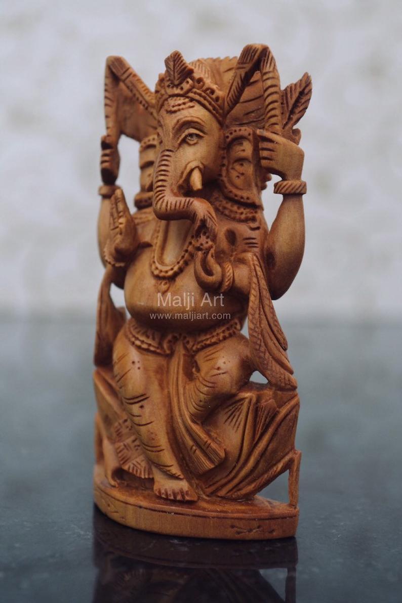 Sandalwood beautiful Hand Carved Small Ganesha Idol - Malji Arts