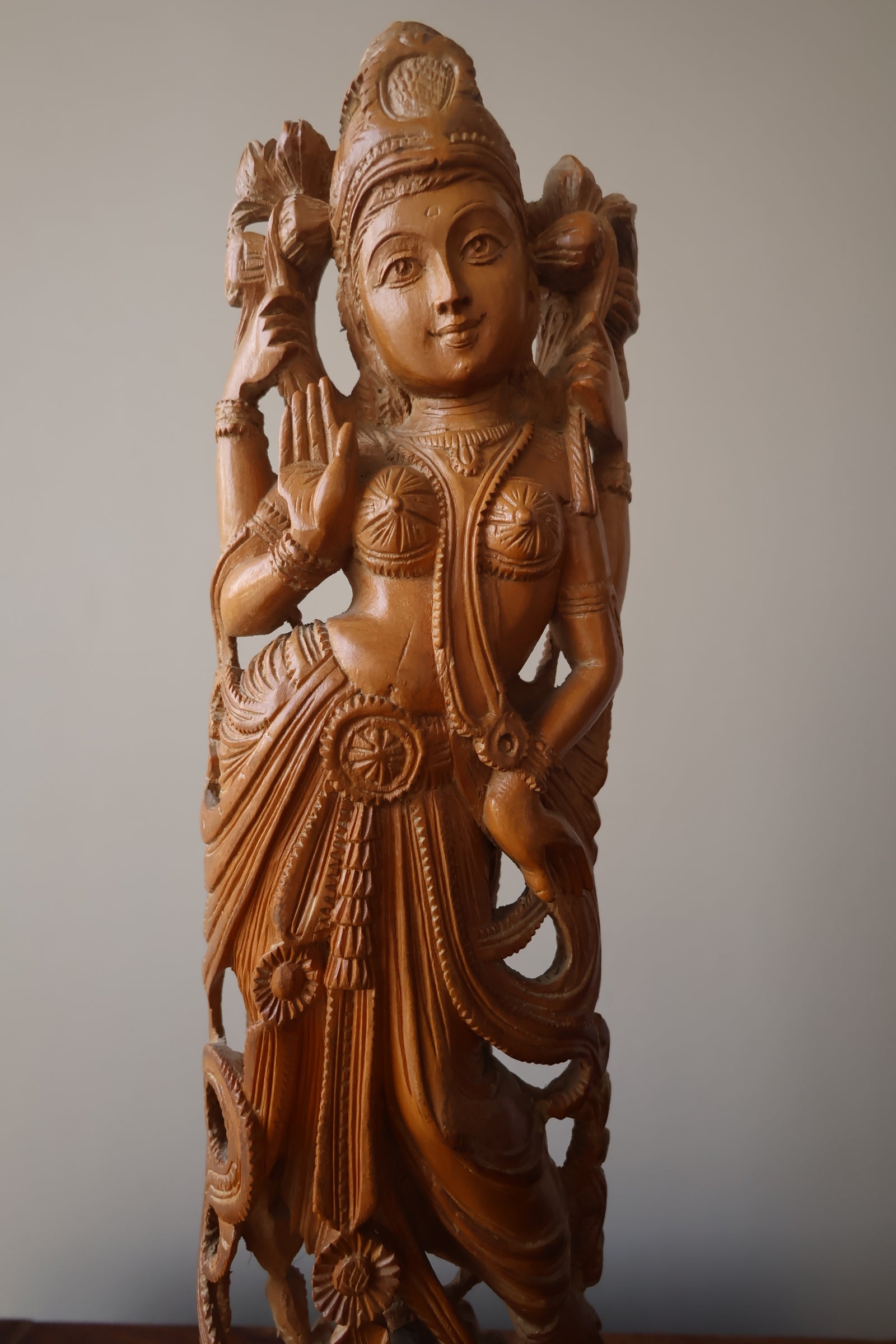 Sandalwood Hand Carved Round Goddess Laxmi Statue - Malji Arts