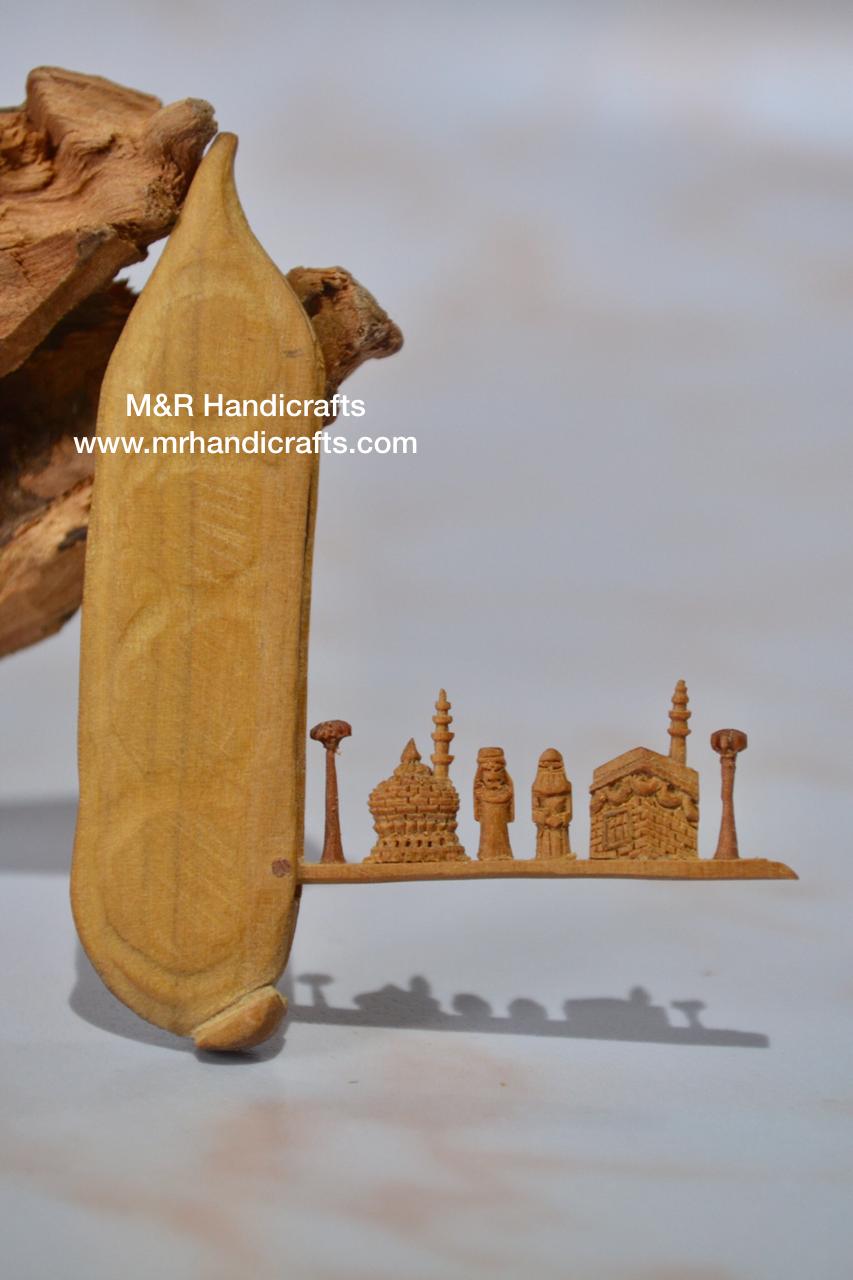 Sandalwood Miniature Carved Peapod Bean Features The Makkah Madina Inside - Malji Arts