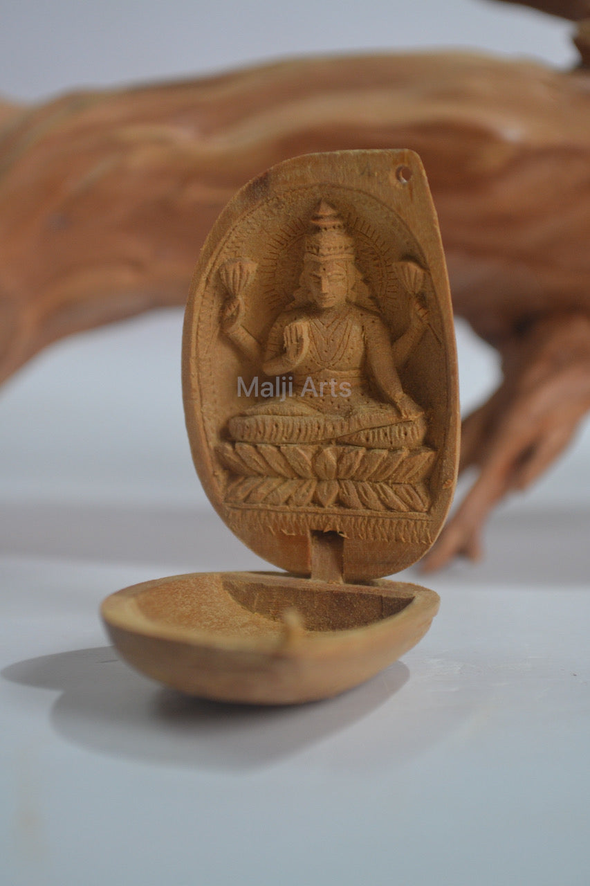 Sandalwood Tiny Goddess Laxmi in Almond - Malji Arts