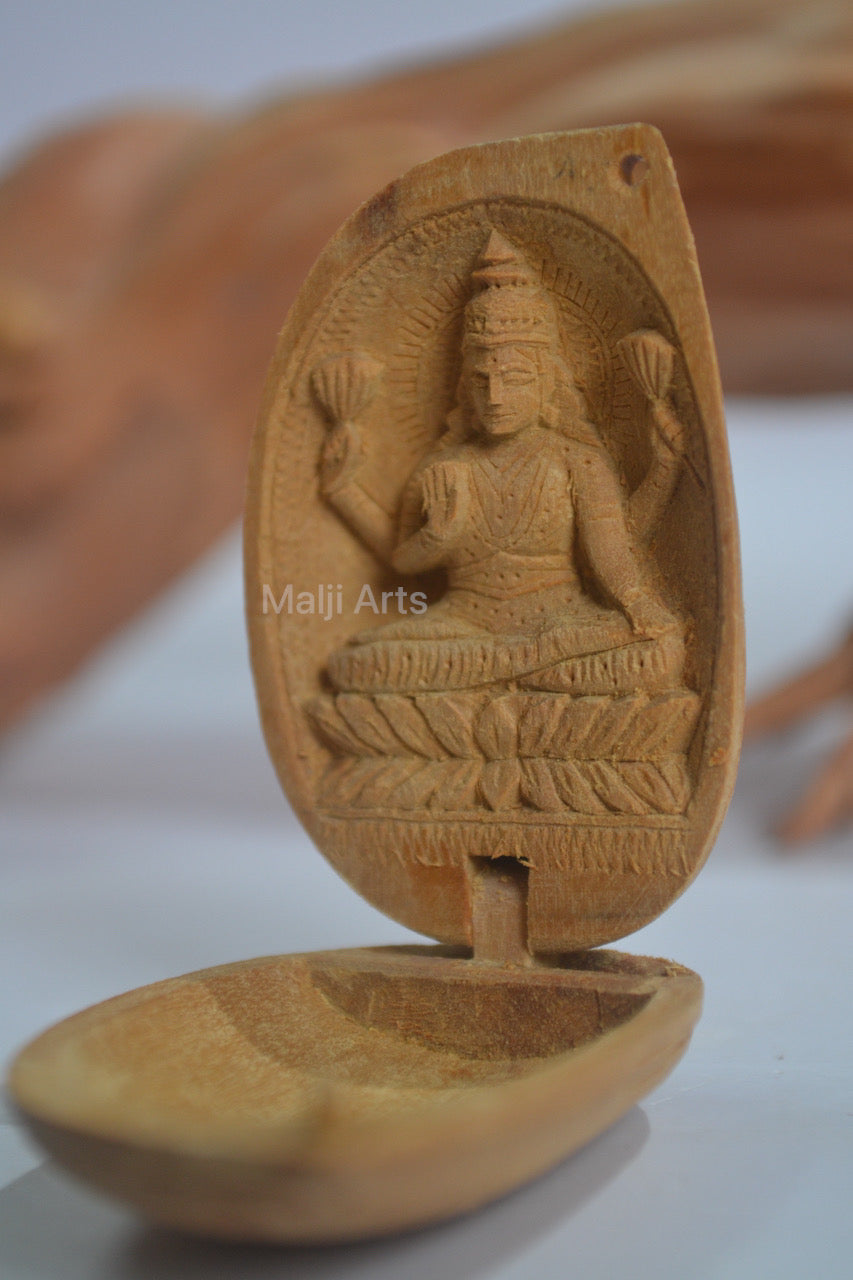 Sandalwood Tiny Goddess Laxmi in Almond - Malji Arts