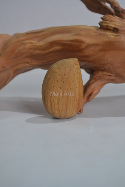 Sandalwood Miniature Tirupati Balaji in Almond Shape - Malji Arts