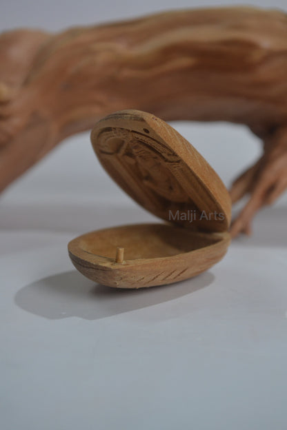 Sandalwood Miniature Tirupati Balaji in Almond Shape - Malji Arts