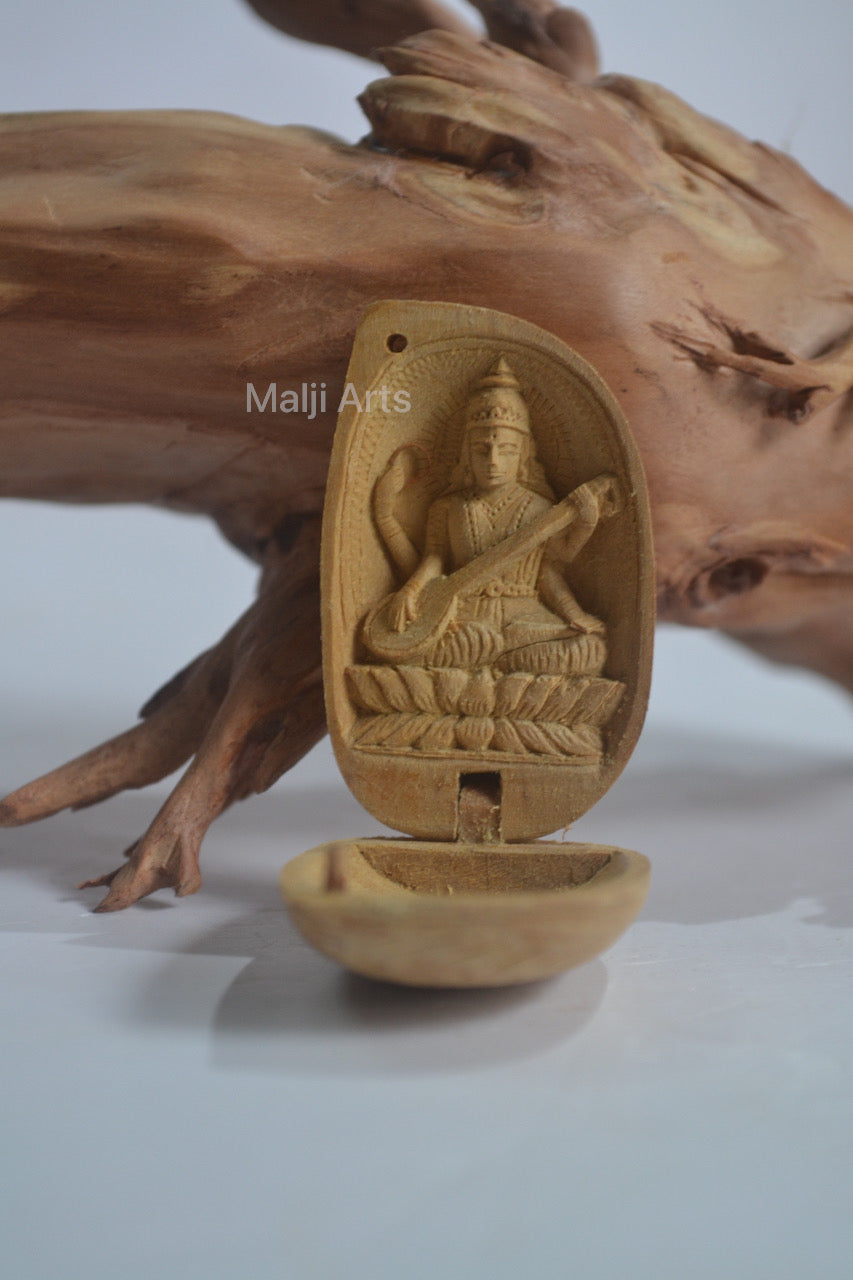 Sandalwood Miniature Saraswati In Almond - Malji Arts