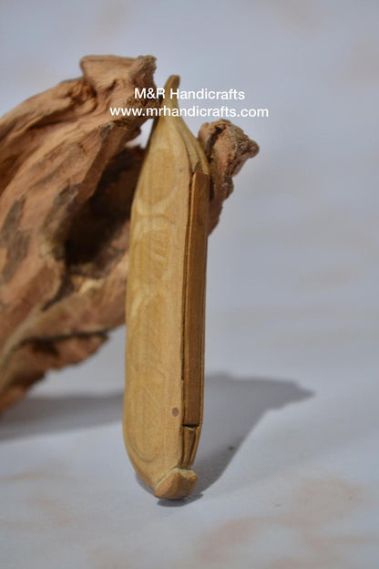 Sandalwood Miniature Carved Peapod Bean Features The Makkah Madina Inside - Malji Arts