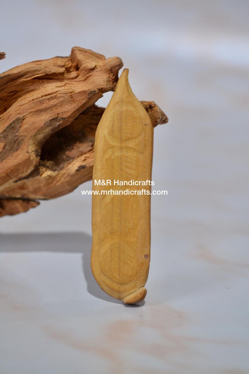 Sandalwood Miniature Carved Peapod Bean Features The Makkah Madina Inside - Malji Arts