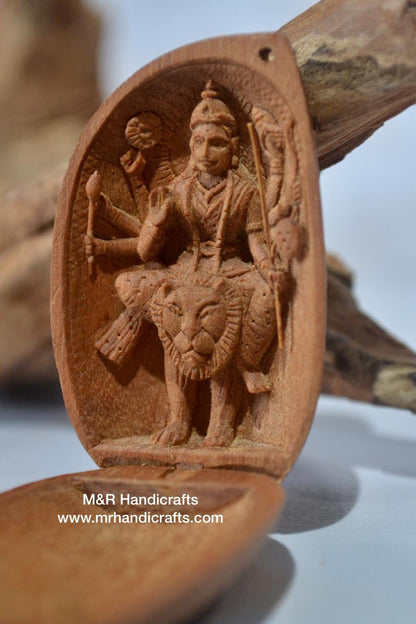 Sandalwood Carved Opening Almond Depicted Durga Statue Carved Inside - Malji Arts