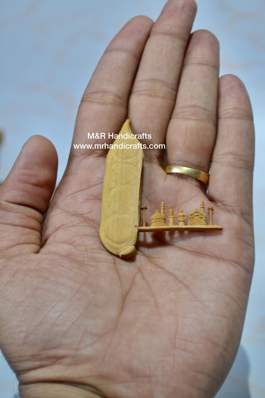 Sandalwood Miniature Carved Peapod Bean Features The Makkah Madina Inside - Malji Arts