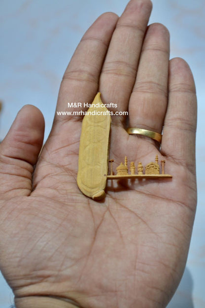 Sandalwood Miniature Carved Peapod Bean Features The Makkah Madina Inside - Malji Arts