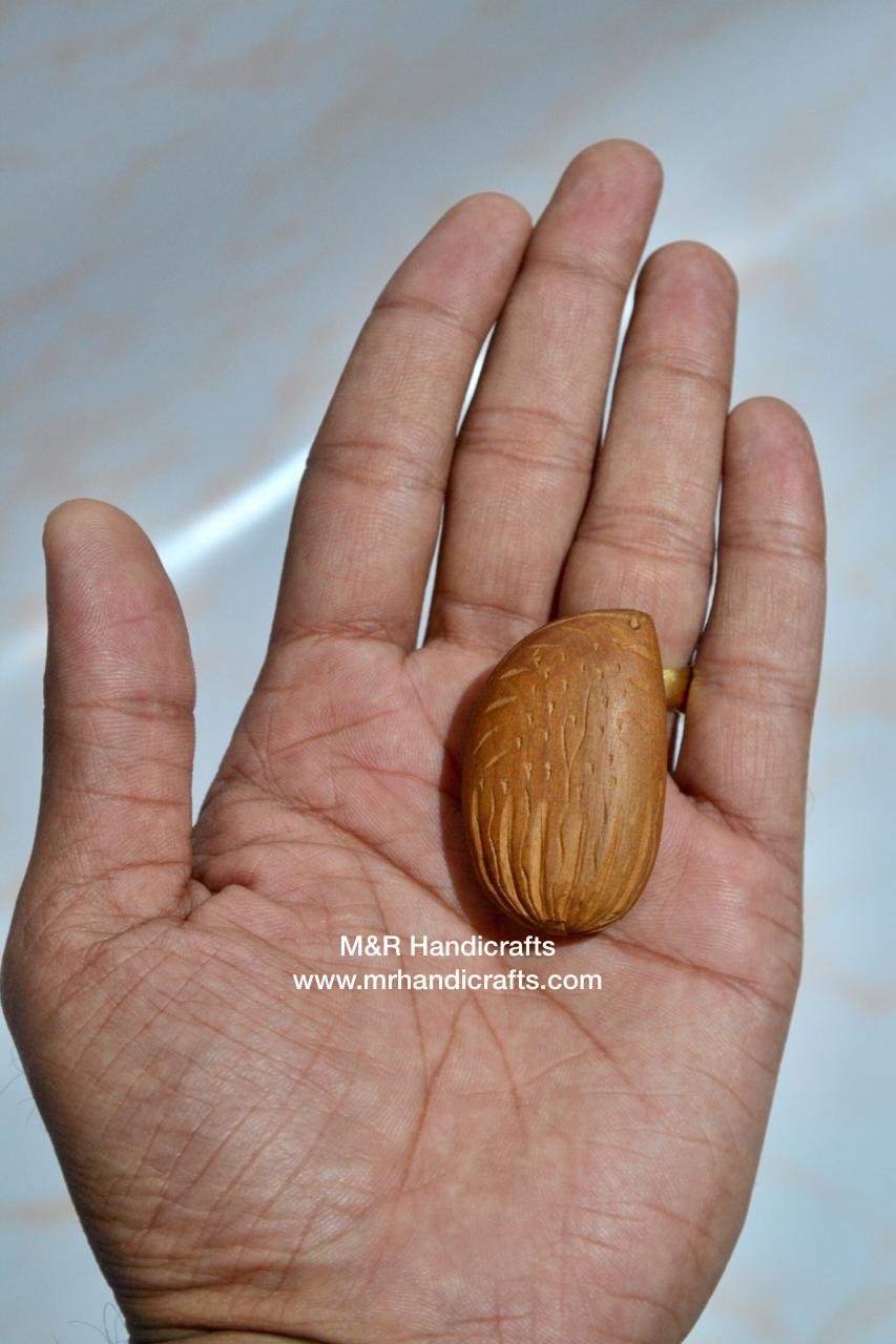 Sandalwood Carved Opening Almond Depicted Durga Statue Carved Inside - Malji Arts