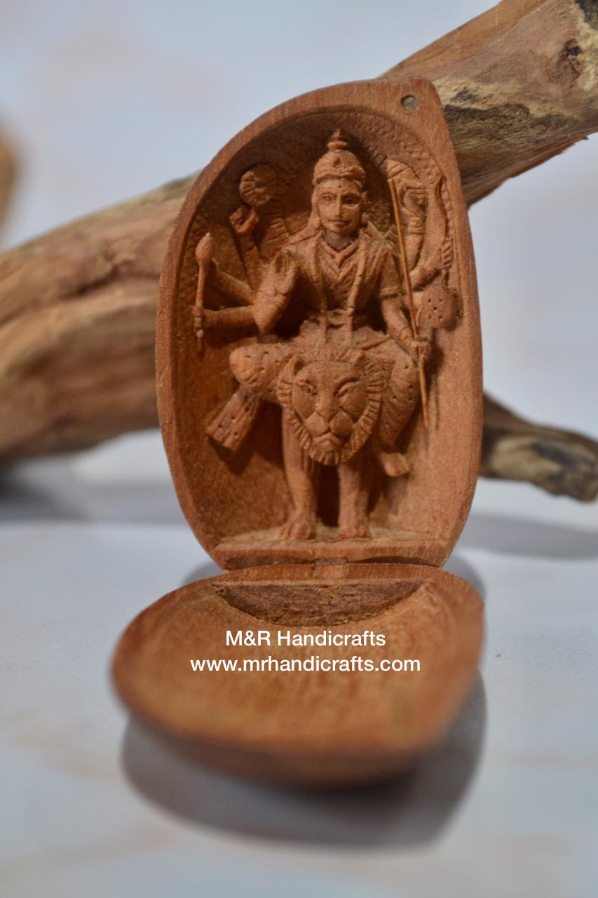 Sandalwood Carved Opening Almond Depicted Durga Statue Carved Inside - Malji Arts