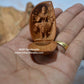 Sandalwood Carved Opening Almond Depicted Durga Statue Carved Inside - Malji Arts
