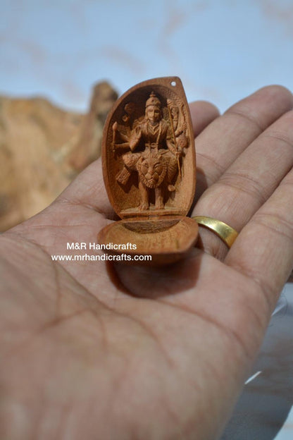 Sandalwood Carved Opening Almond Depicted Durga Statue Carved Inside - Malji Arts