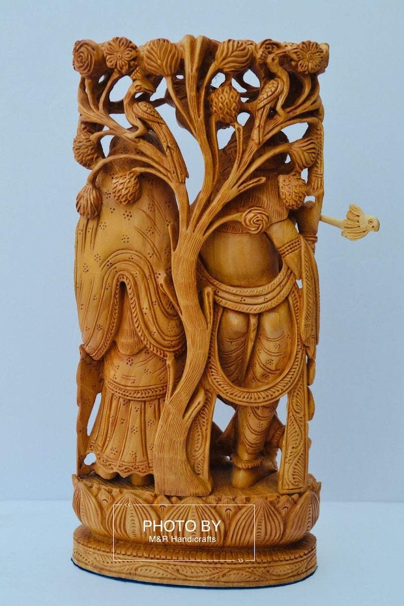 Wooden hand carved radha krishna jodi under tree - Malji Arts