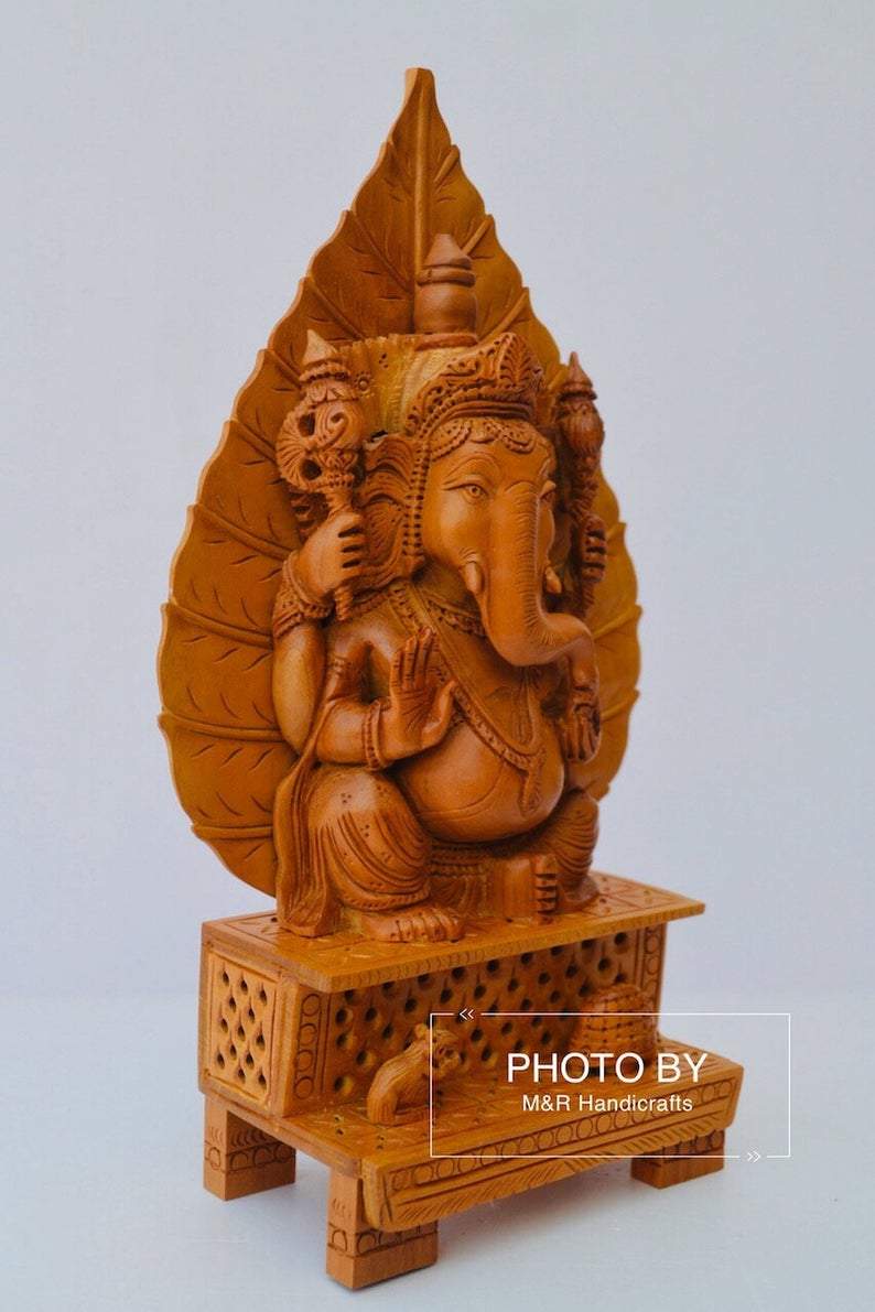 Sandalwood Fine Hand Carved Ganesh Statue on Leaf - Malji Arts