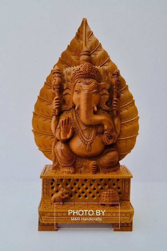 Sandalwood Fine Hand Carved Ganesh Statue on Leaf - Malji Arts