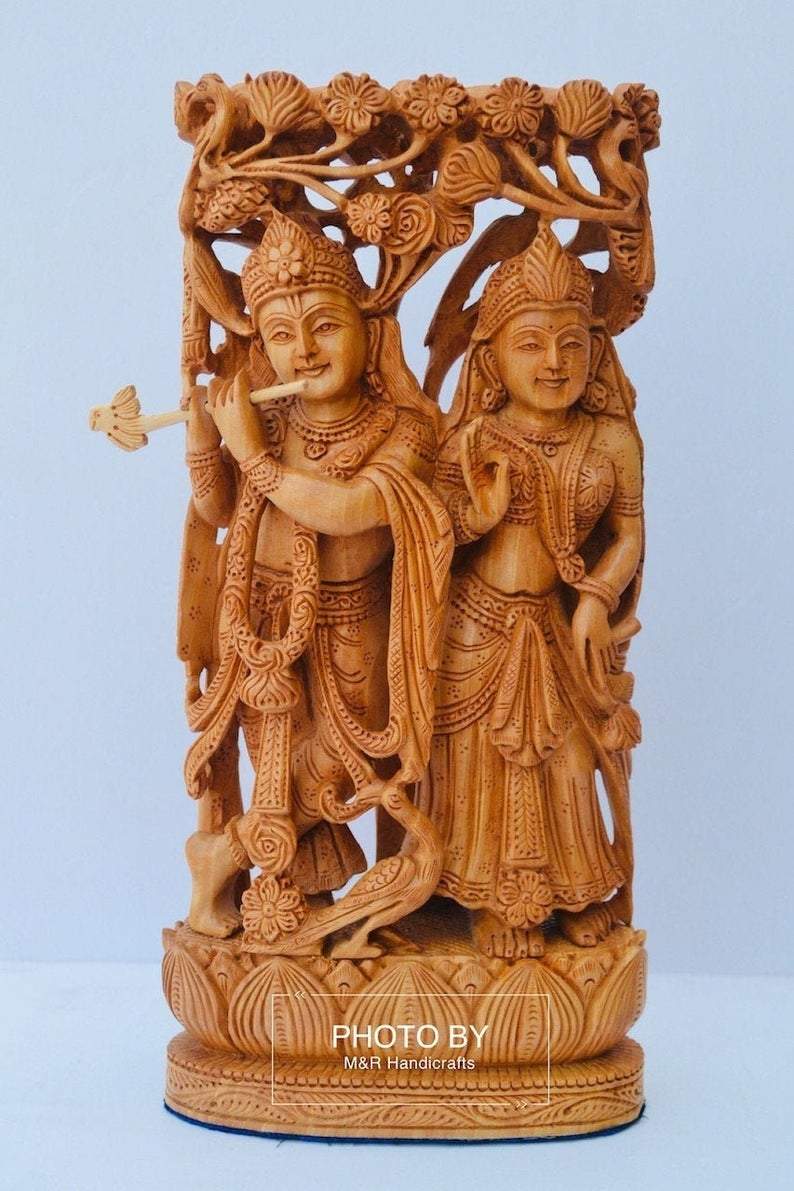 Wooden hand carved radha krishna jodi under tree - Malji Arts