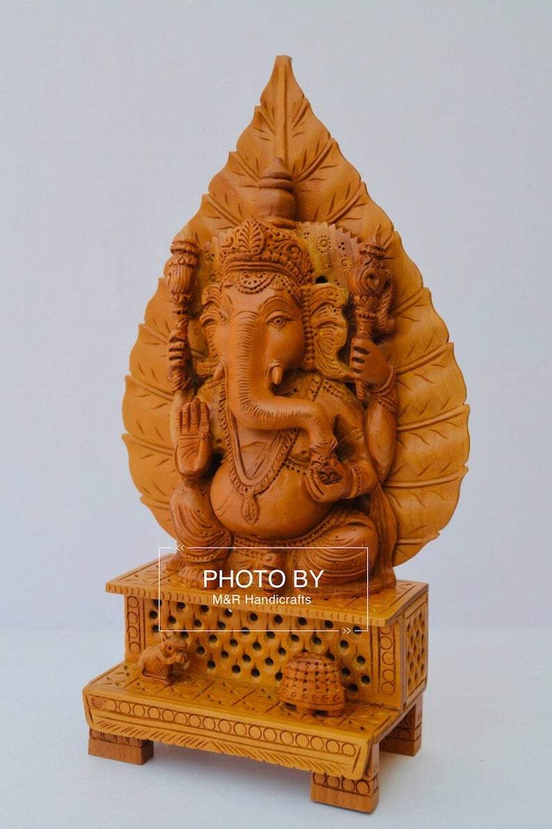 Sandalwood Fine Hand Carved Ganesh Statue on Leaf - Malji Arts