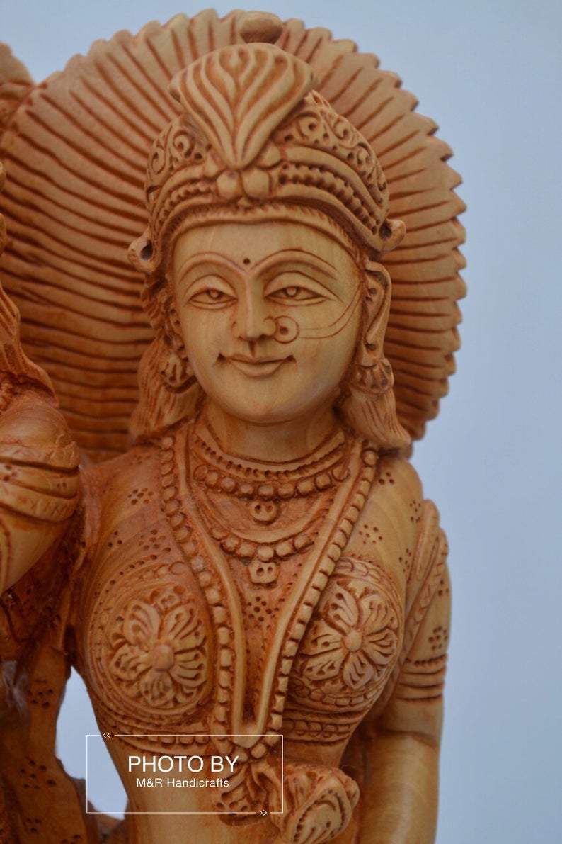 Wooden beautifully hand carved radha krishna statue - Malji Arts
