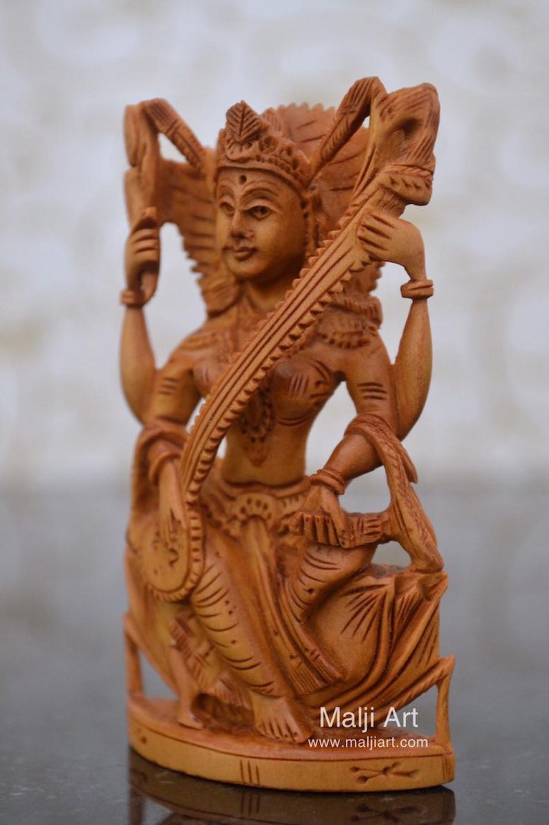 Sandalwood Beautifully Carved Goddess Saraswati Statue - Malji Arts