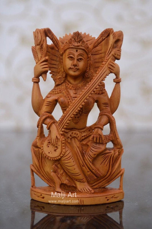 Sandalwood Beautifully Carved Goddess Saraswati Statue - Malji Arts