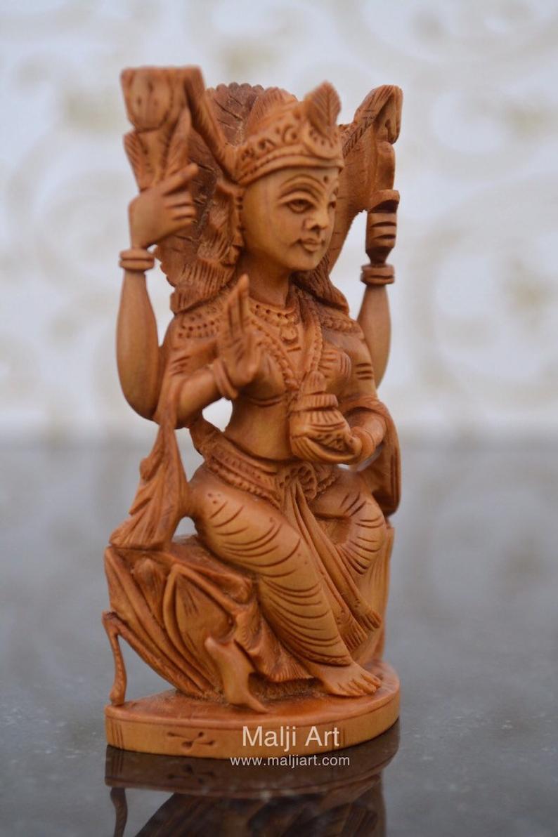Hand Carved Sandalwood Small Statue of Goddess Laxmi - Malji Arts