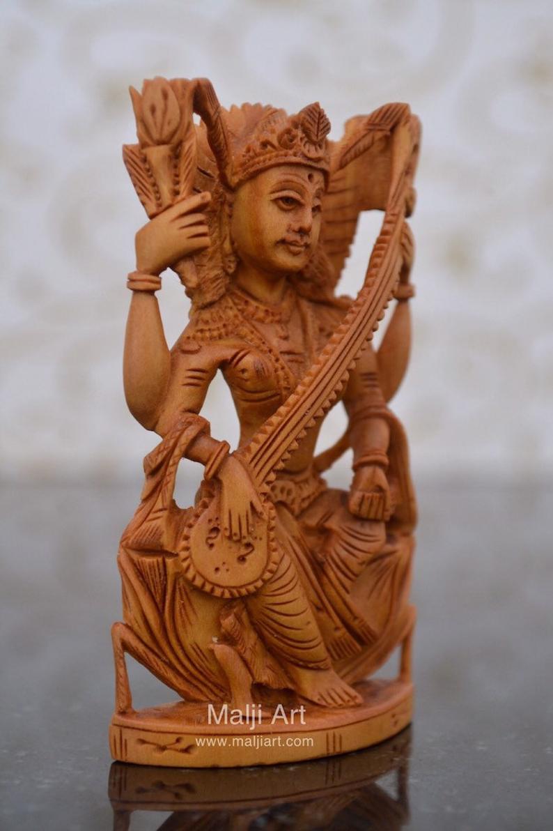 Sandalwood Beautifully Carved Goddess Saraswati Statue - Malji Arts