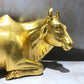 The Golden Cow, Wooden Pure Gold Plated Sitting Cow Statue - Malji Arts