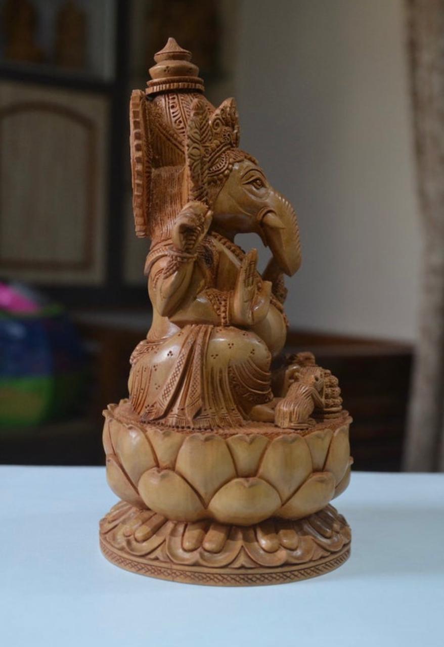 sandalwood beautifully hand carved lord ganesha sitting on lotus - Malji Arts