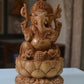 sandalwood beautifully hand carved lord ganesha sitting on lotus - Malji Arts
