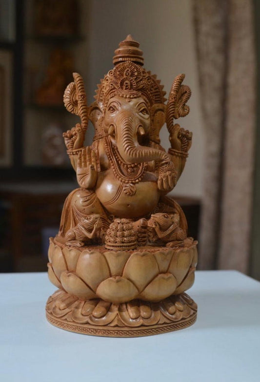 sandalwood beautifully hand carved lord ganesha sitting on lotus - Malji Arts