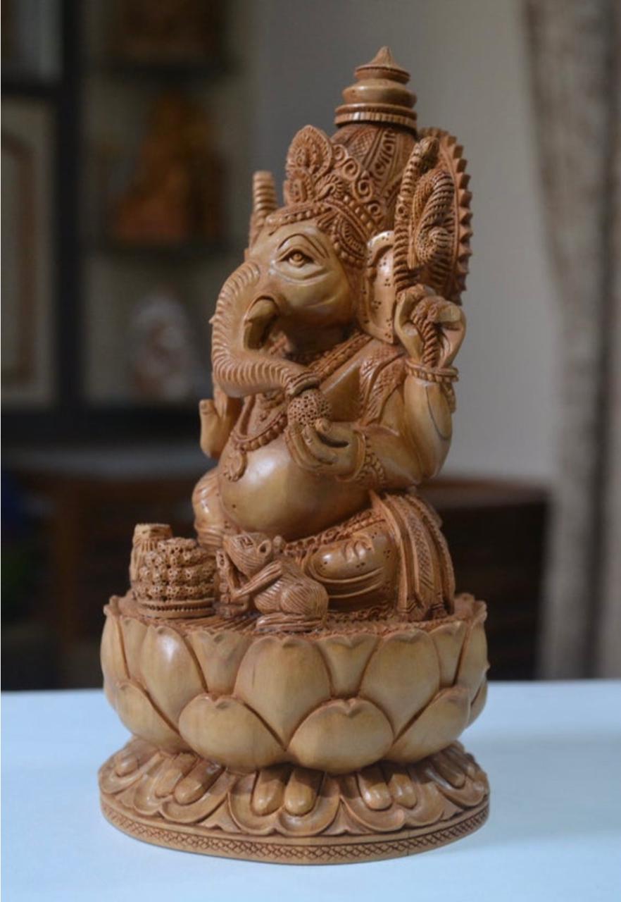 sandalwood beautifully hand carved lord ganesha sitting on lotus - Malji Arts