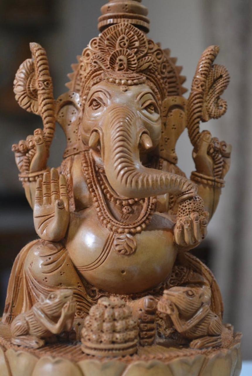 sandalwood beautifully hand carved lord ganesha sitting on lotus - Malji Arts